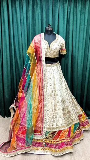 Cream Banarsi Silk Lehenga With Zari, Mirror And Multi Colour Border