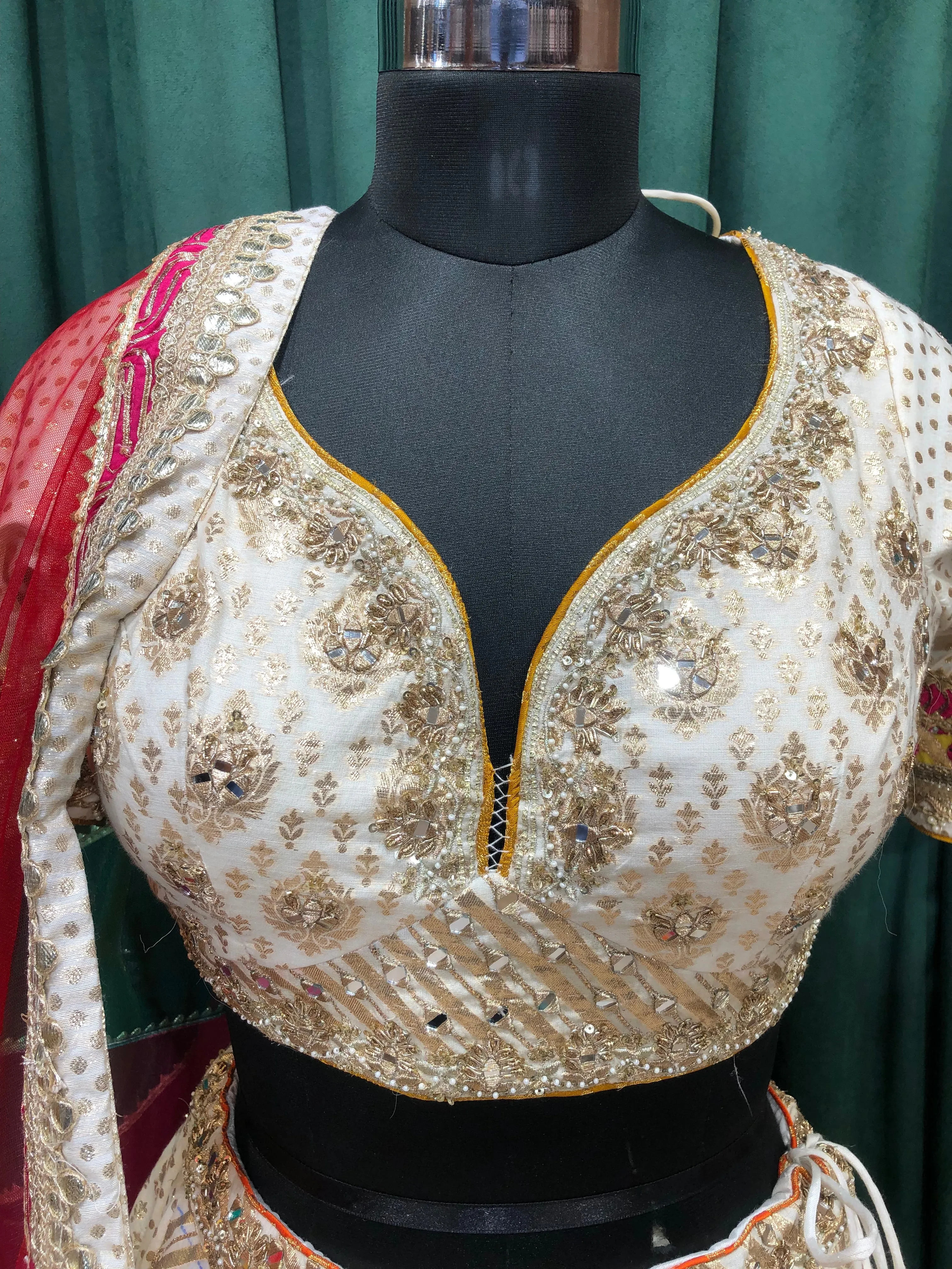 Cream Banarsi Silk Lehenga With Zari, Mirror And Multi Colour Border