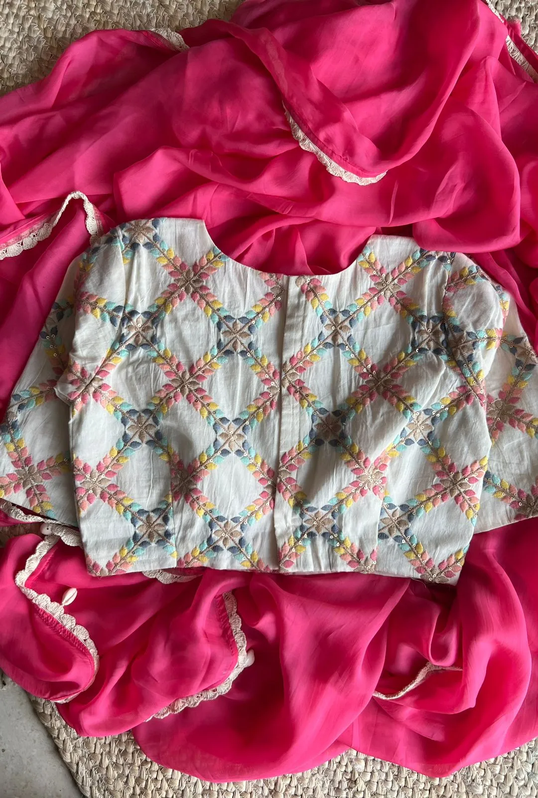 Pink organza saree with cotton embroidery blouse
