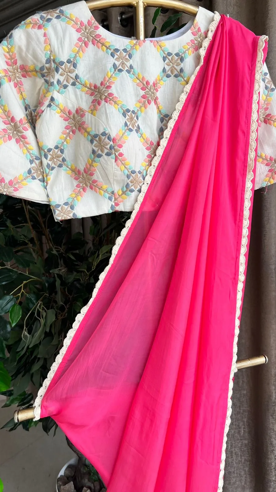 Pink organza saree with cotton embroidery blouse