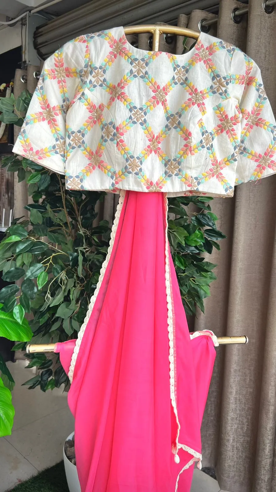 Pink organza saree with cotton embroidery blouse