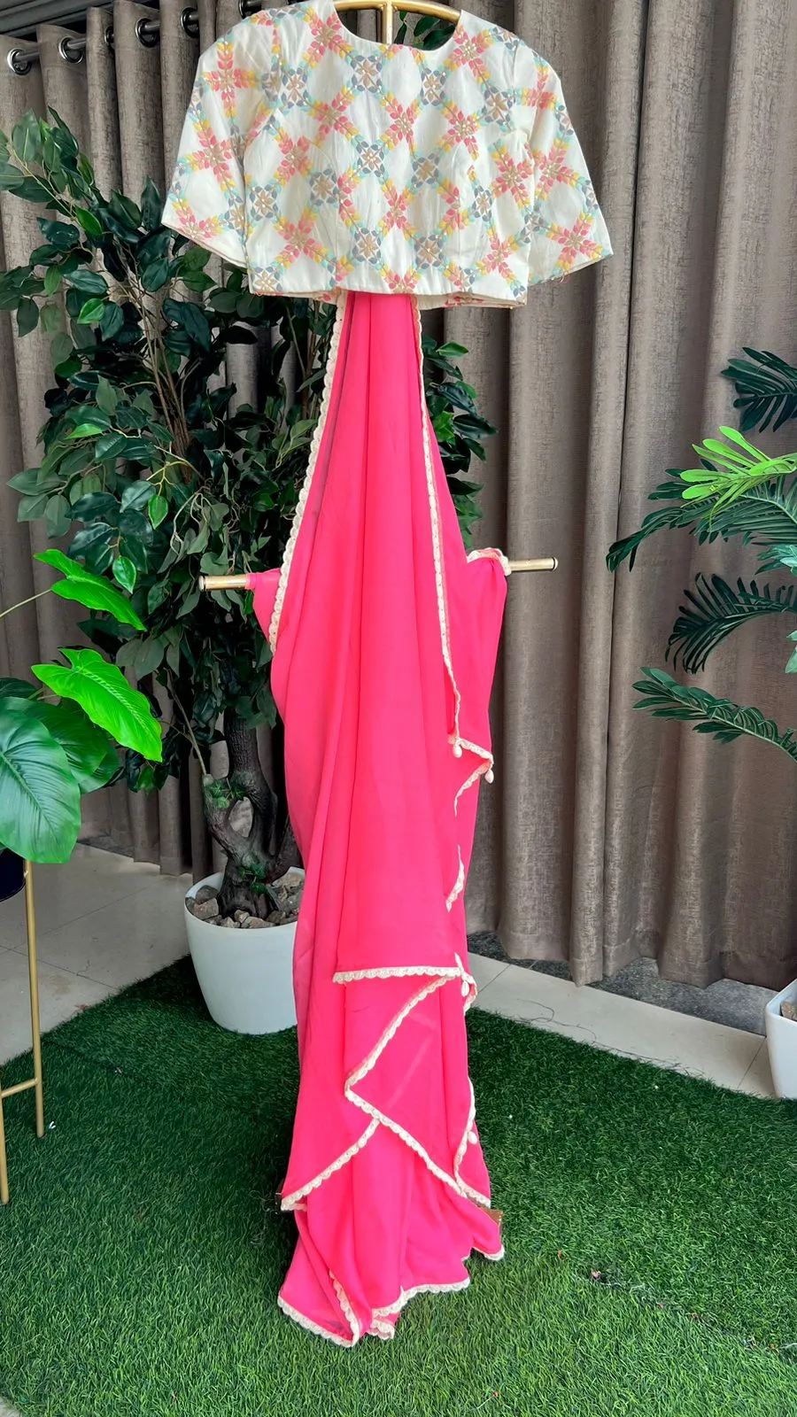 Pink organza saree with cotton embroidery blouse