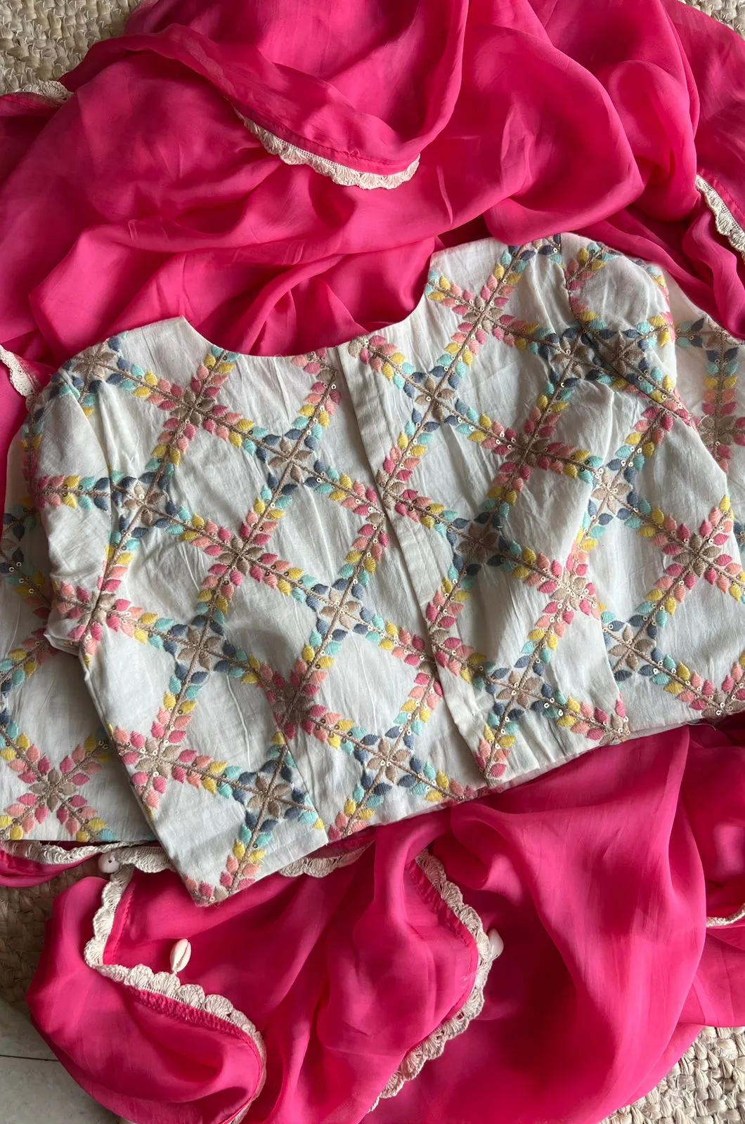 Pink organza saree with cotton embroidery blouse