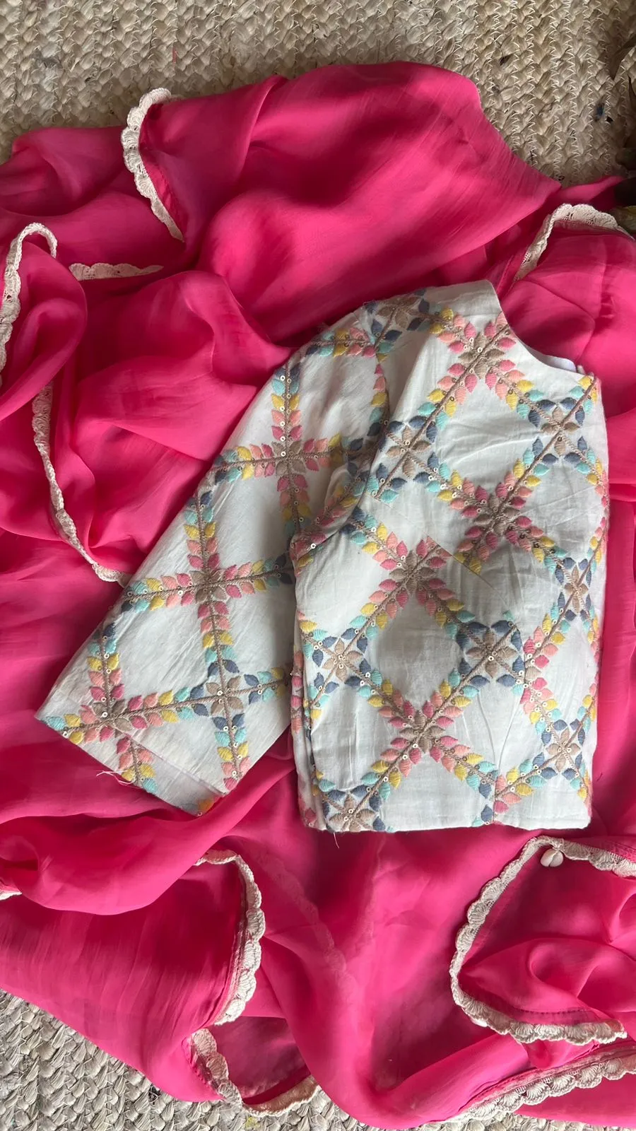 Pink organza saree with cotton embroidery blouse